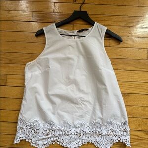 Banana Republic White Sleeveless Top with Lace Hem and a button in the back